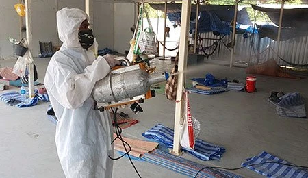 Disinfectant Spray in Workplace