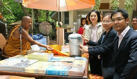 Hands In Unusable Electric Appliances and Office Equipments in Nonthaburi Province